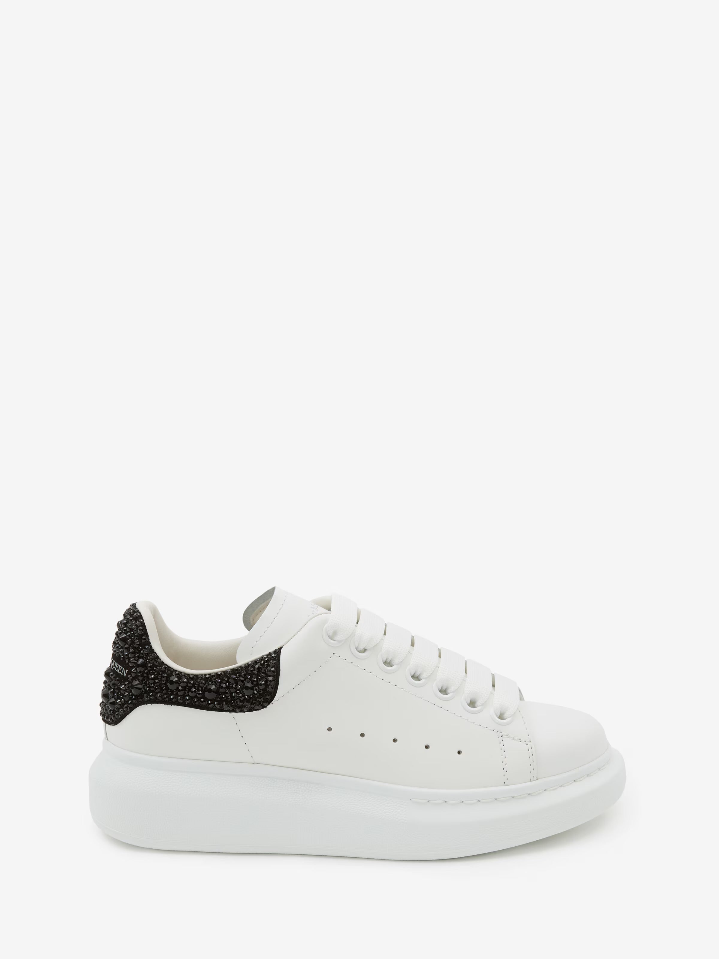 Alexander McQueen sneaker with a jet black crystal-embellished heel counter