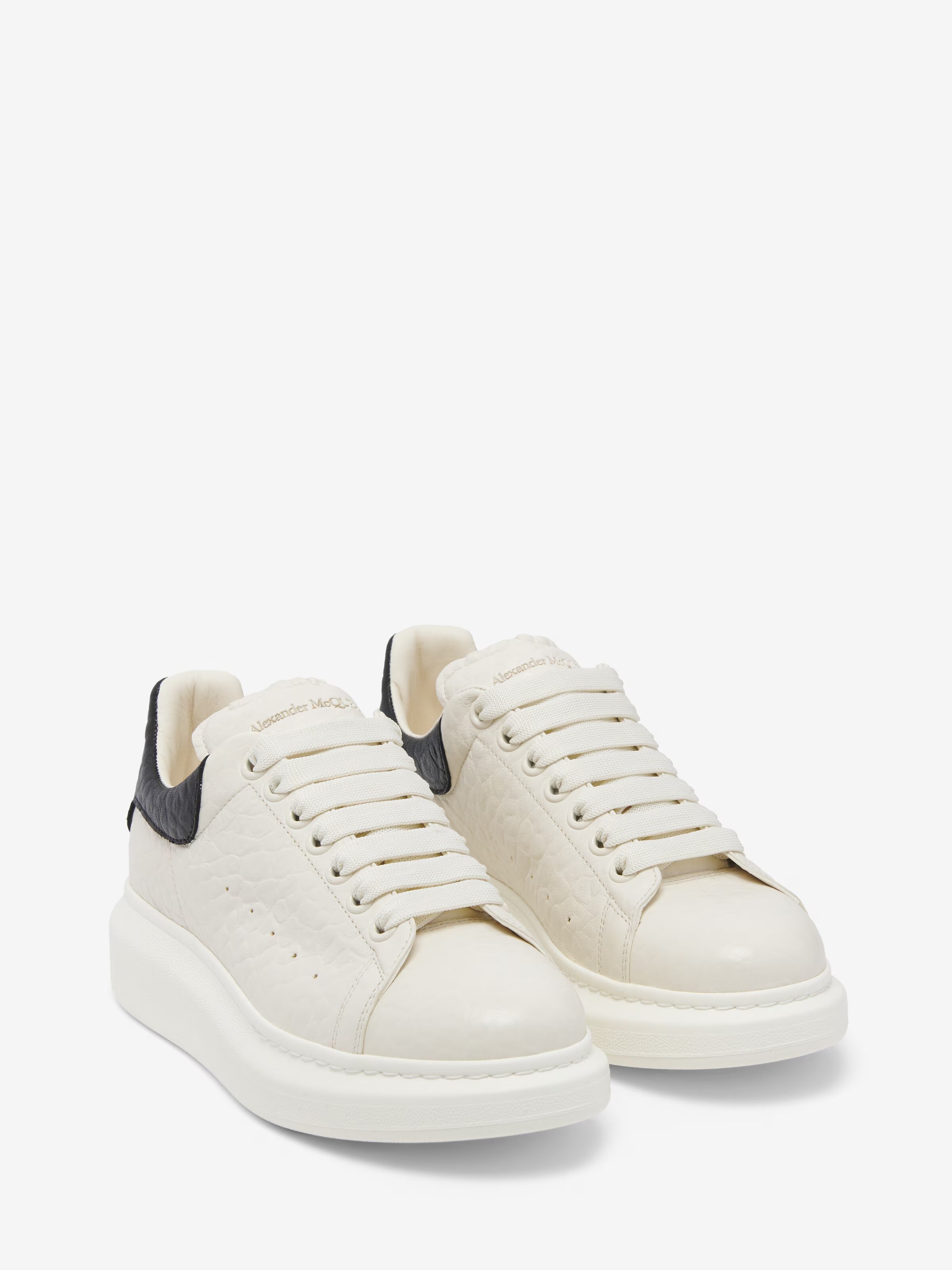 Alexander McQueen Statement silhouette in off white and black grainy leather