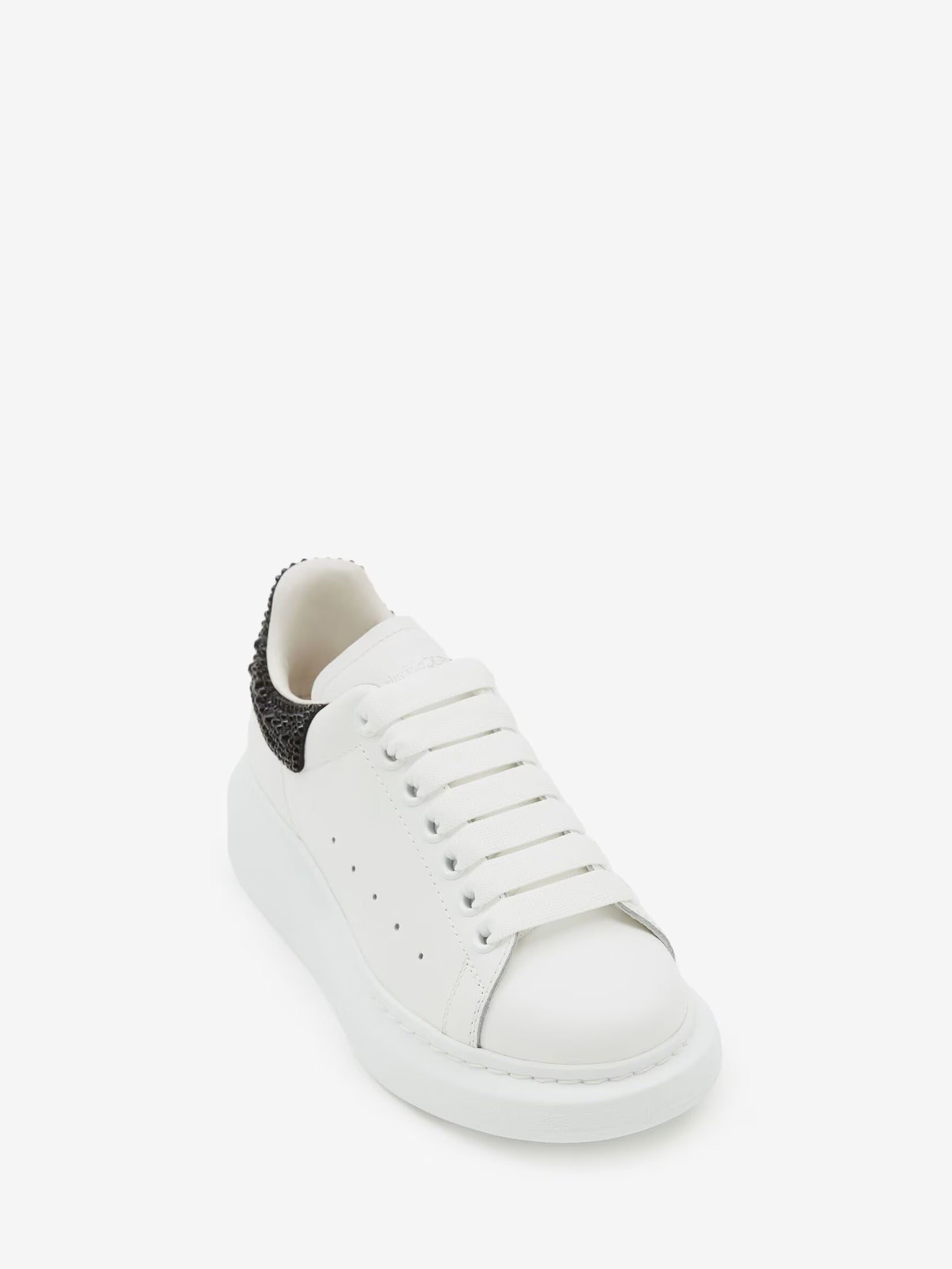 Alexander McQueen sneaker with a jet black crystal-embellished heel counter